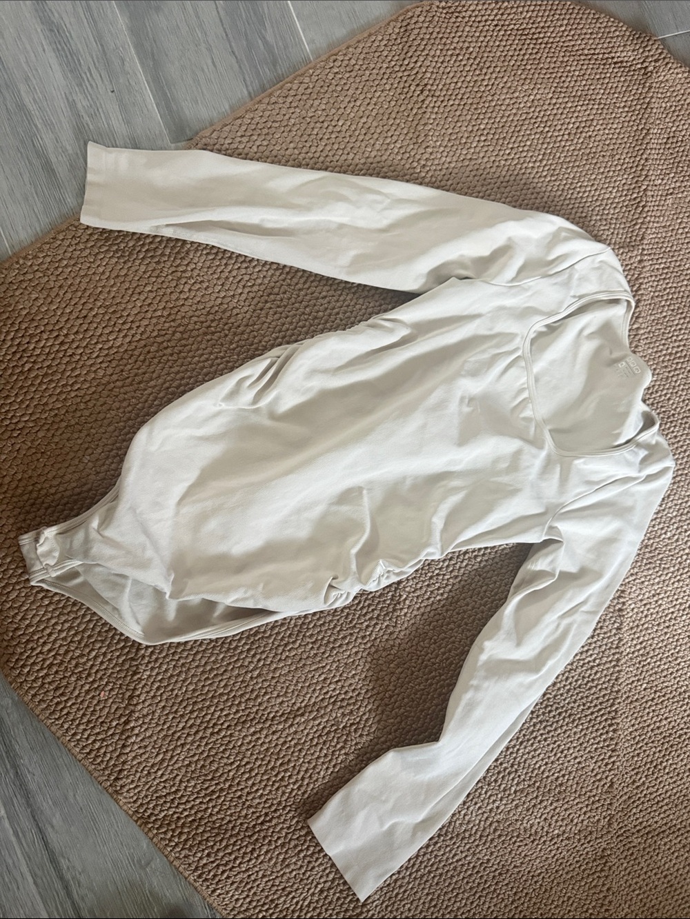 Long Sleeve Scoop Neck Bodysuit in Light Cream